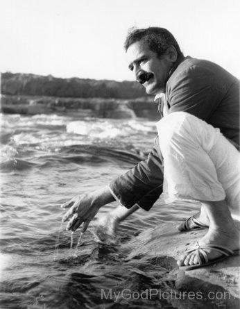 Image Of Avatar Meher Baba Playing With Water