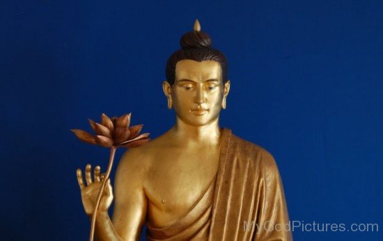Picture Of Lord Gautama Buddha Ji Holding Flower