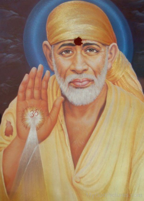 Picture Of Sai Baba Ji In Yellow Dress