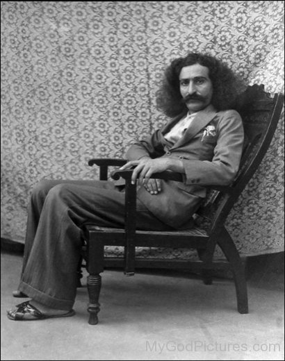 Side Image Of Avatar Meher Baba On Chair