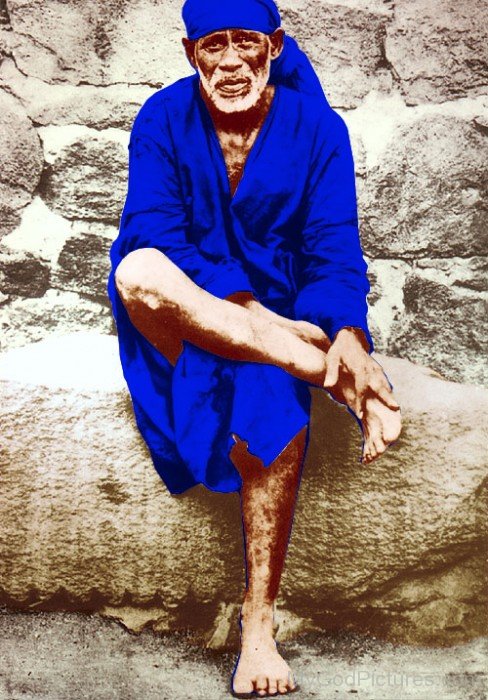 Sitting Picture Of Sai Baba Ji In Blue Dress
