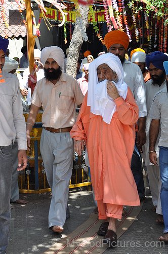 Baba Ajit Singh Ji In Seffron Colour Dress