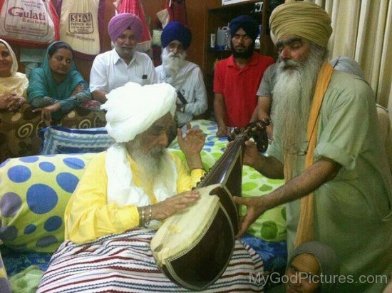 Baba Ajit Singh Ji Playing Musical Instrument
