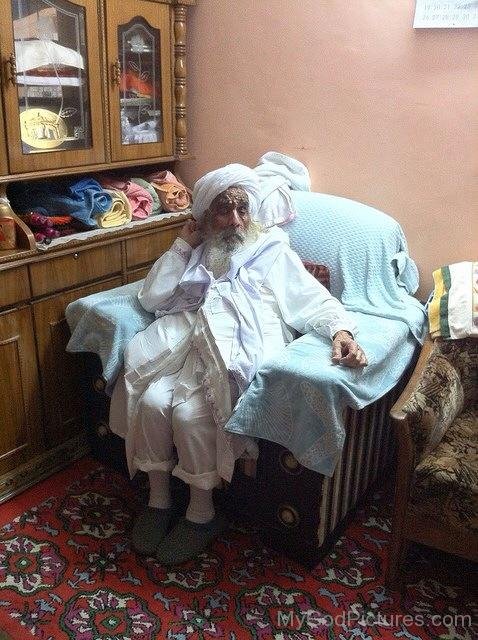 Beautiful Image Of Baba AJit Singh Ji Sitting On Sofa