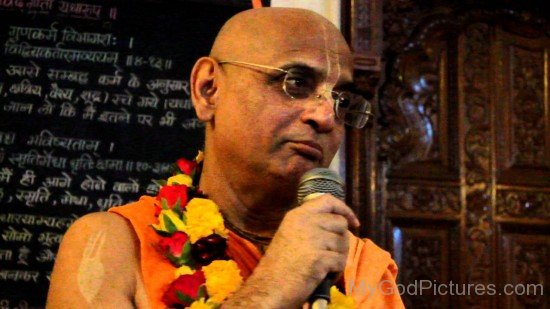 Bhakti Charu Swami Holding Mic