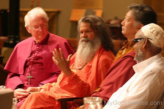 Swami Maheshwarananda Sitting With People