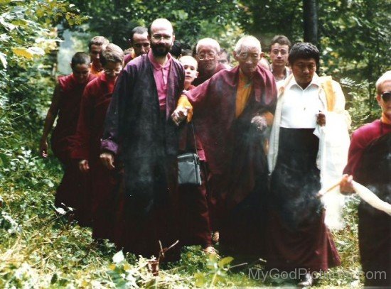 Kalu Rinpoche Walking With His Disciples