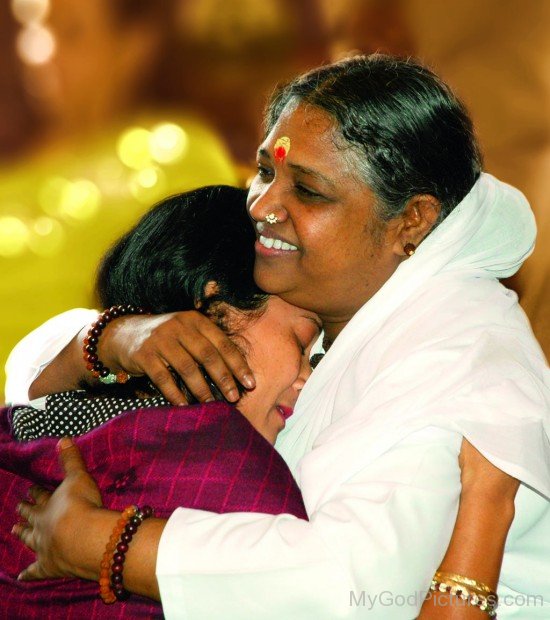 Mata Amritanandamayi Hugs Lady