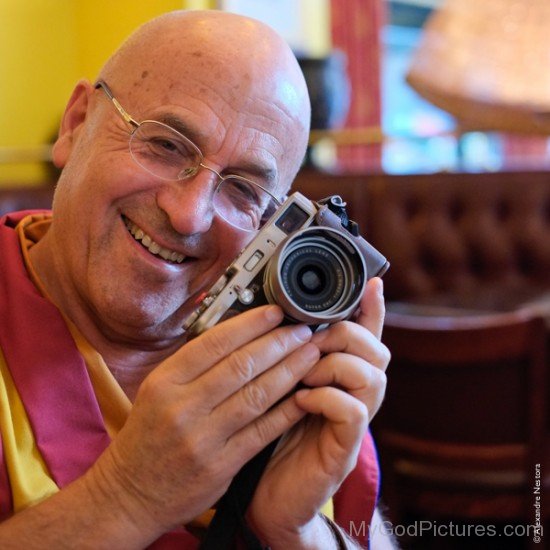 Matthieu Ricard Holding Mic