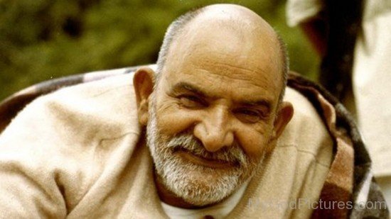 [Image: Neem-Karoli-Baba-Photo-550x309.jpg]