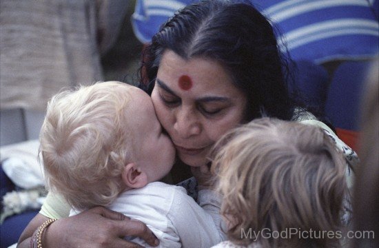 Nirmala Srivastava With Little Child