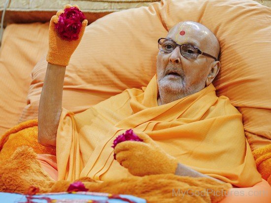 Pramukh Swami Maharaj Holding Roses