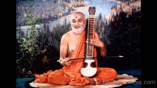 Pramukh Swami Maharaj Playing Sitar