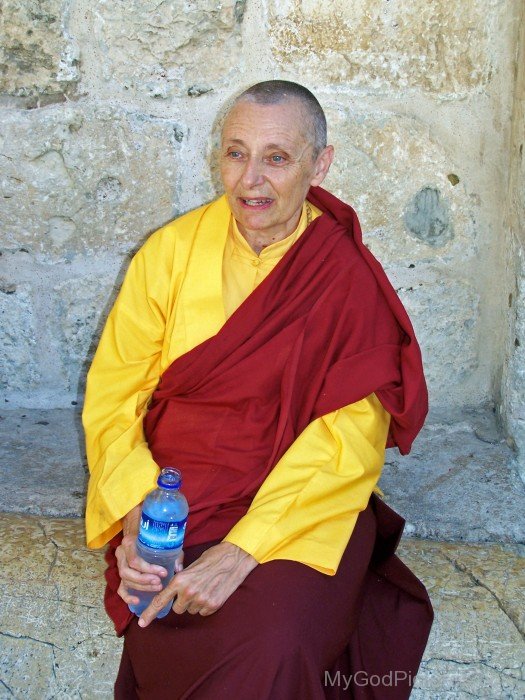Tenzin Palmo Holding Water Bottle