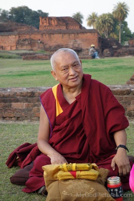 Thubten Zopa Rinpoche Sitting On Ground