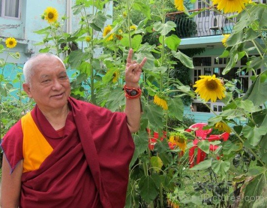 Thubten Zopa Rinpoche With Flowers