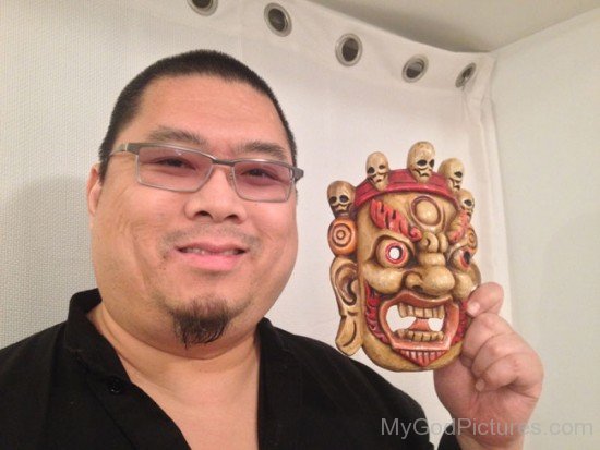 Tsem Tulku Holding Mask