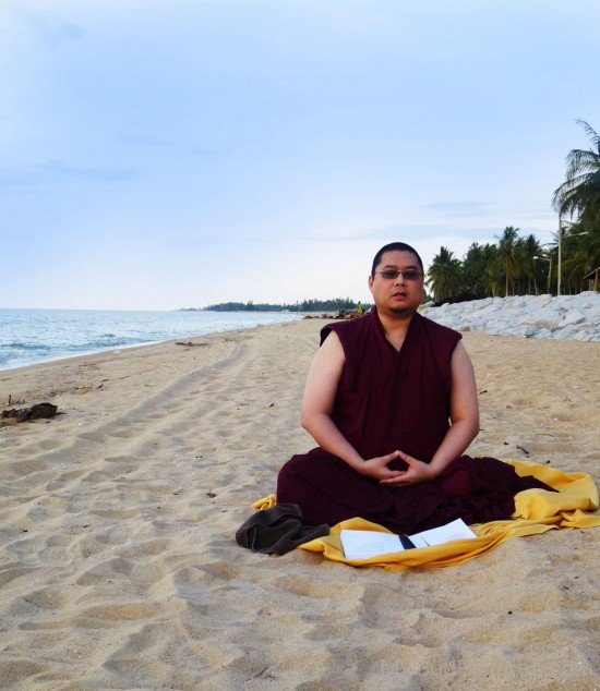 Tsem Tulku Sitting On Sand