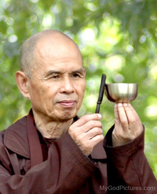 Thich Nhat Hanh Holding Steel Bowl