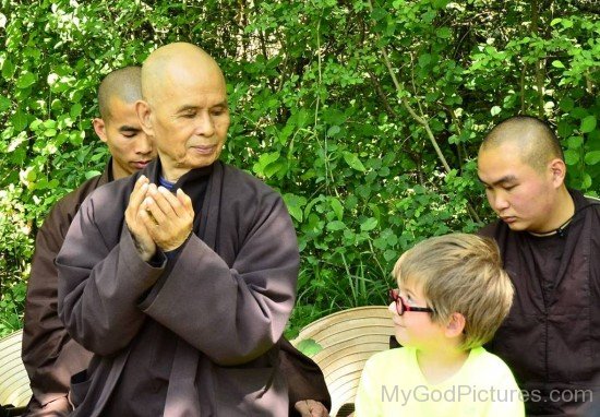 Thich Nhat Hanh Looking At Little Boy