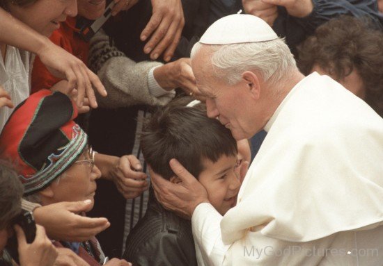 Pope John Paul II Kissing Child