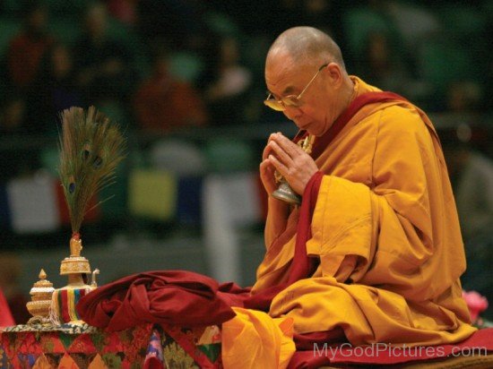 Tenzin Gyatso Praying