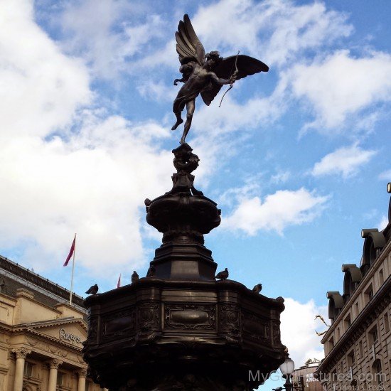 God Cupid Statue Armed With A Bow