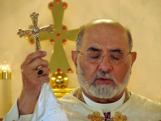 Mar Dinkha IV Holding Cross